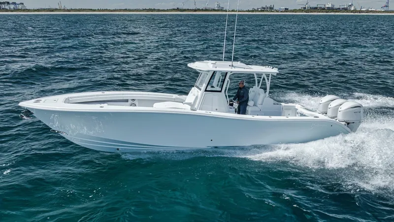 Slide: The Image of 2025 Yellowfin 36 Offshore boat cruising on open water. - 1