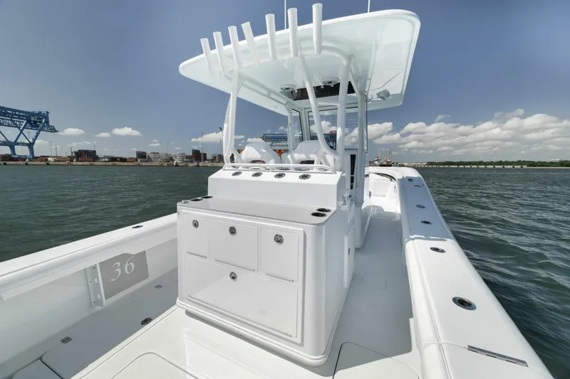 Slide: The Image of 2025 Yellowfin 36 Offshore boat on water, featuring sleek design and spacious deck. - 20