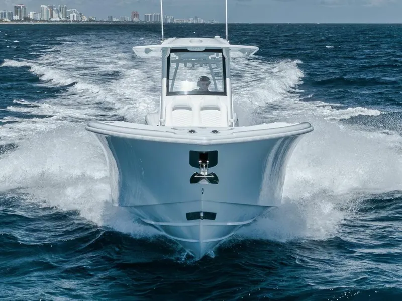Slide: The Image of 2025 Yellowfin 36 Offshore boat cruising on open ocean waters. - 3