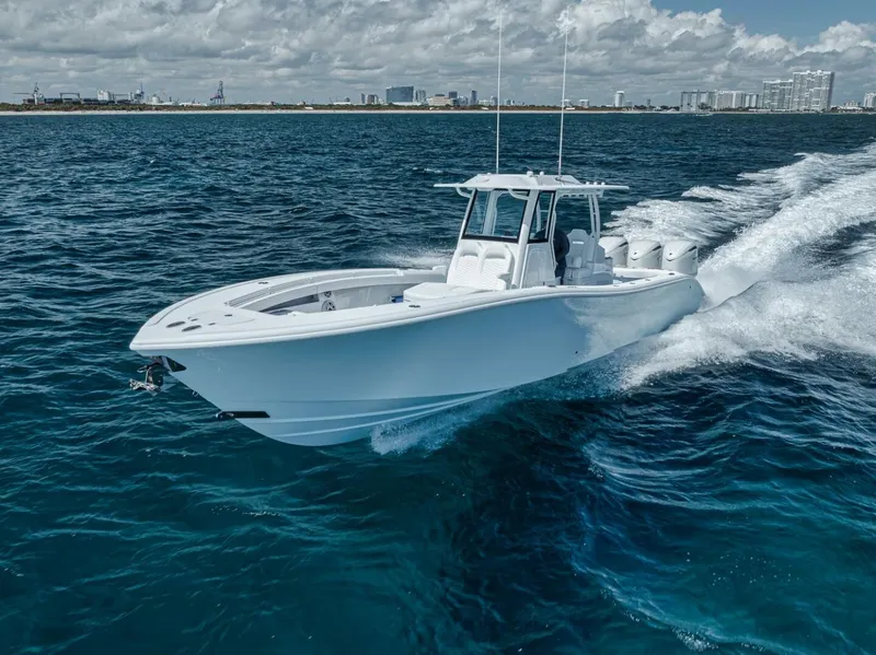 Slide: The Image of 2025 Yellowfin 36 Offshore boat cruising on open ocean waters. - 40