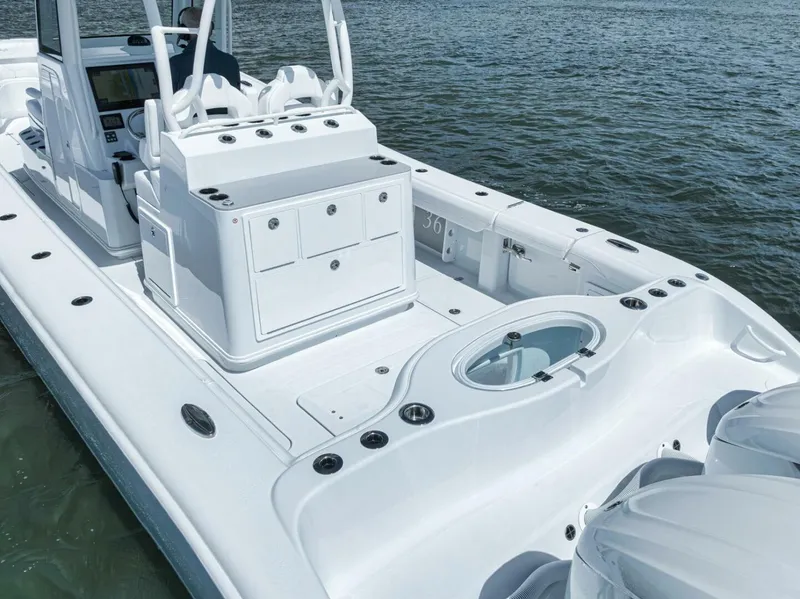 Slide: The Image of 2025 Yellowfin 36 Offshore boat with spacious deck and seating on water. - 6