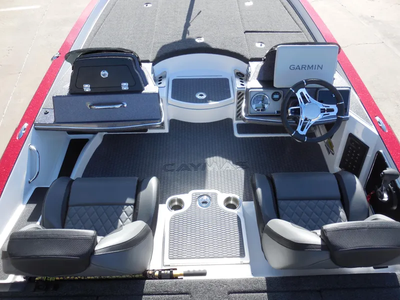 Slide: The Image of 2025 Caymas CX21Pro boat interior with Garmin navigation, dual seats, and storage compartments. - 5