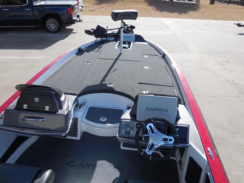 Slide: The Image of 2025 Caymas CX21Pro boat interior with Garmin navigation system and fishing deck. - 6