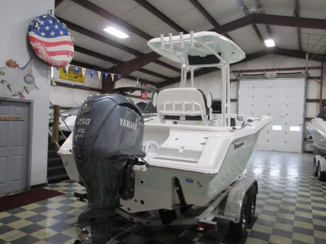 Slide: The Image of 2025 Tidewater 220 LXF boat with Yamaha 250 V6 engine in showroom. - 4