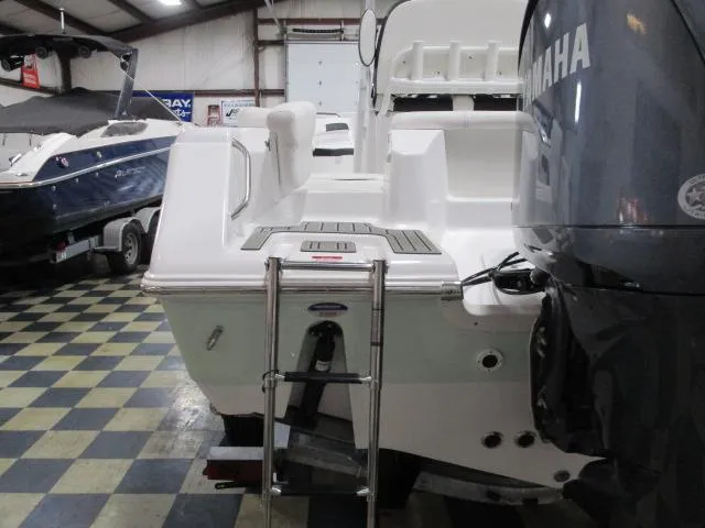 Slide: The Image of 2025 Tidewater 220 LXF boat with Yamaha engine in showroom. - 5