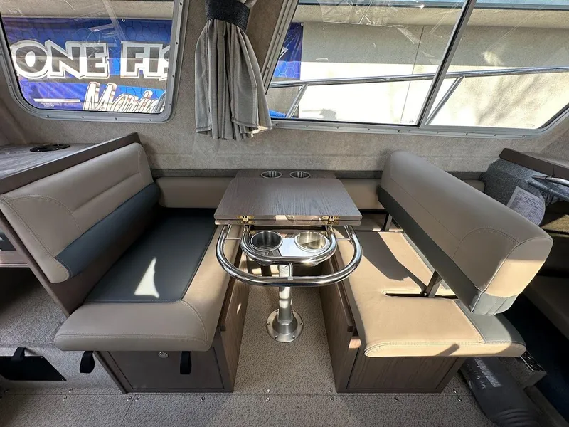 Slide: The Image of Interior of 2025 KingFisher 2725 XRS boat with dining area and seating. - 31