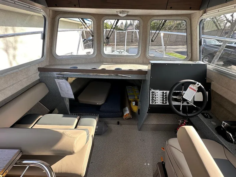 Slide: The Image of Interior of 2025 KingFisher 2725 XRS boat with seating and steering console. - 33