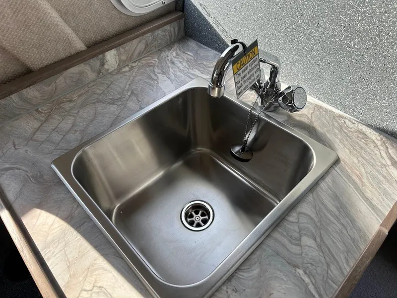 Slide: The Image of Stainless steel sink in 2025 KingFisher 2725 XRS boat kitchen. - 42