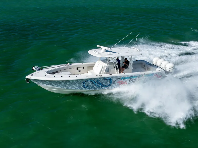 Slide: The Image of 2022 SeaVee 390Z boat speeding on open water, showcasing powerful performance. - 0