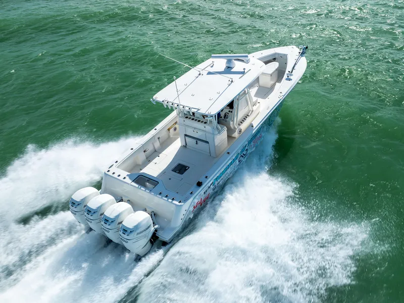 Slide: The Image of 2022 SeaVee 390Z boat cruising on open water with powerful engines. - 4