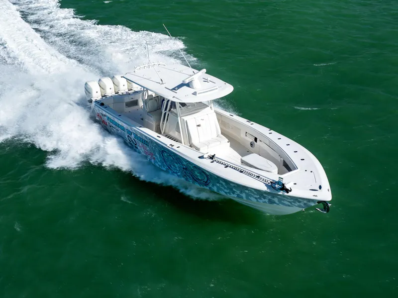 Slide: The Image of 2022 SeaVee 390Z boat cruising on open water. - 7