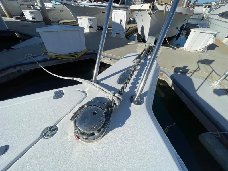 Slide: The Image of 1998 Donzi 3250 LXC boat anchor system at marina dock. - 29