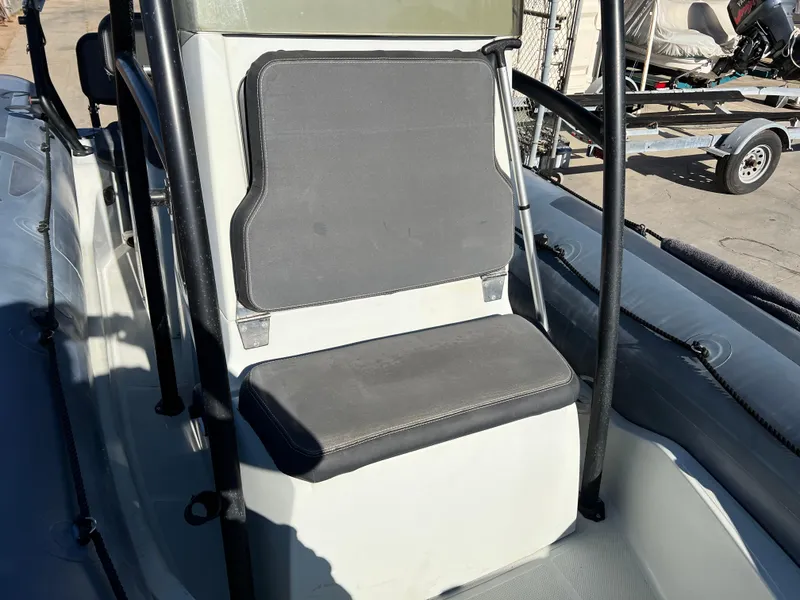 Slide: The Image of Garmin marine radio on 2020 Zodiac Pro 5.5 boat dashboard. - 24