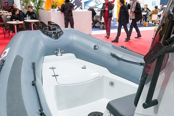 Slide: The Image of Propeller of a 2020 Zodiac Pro 5.5 boat on a trailer in a garage. - 26