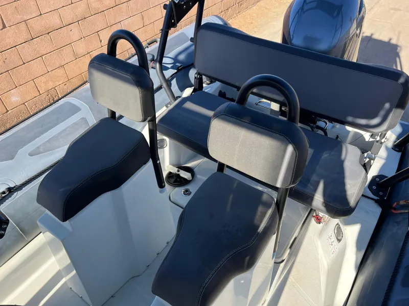 Slide: The Image of 2020 Zodiac Pro 5.5 inflatable boat interior in a garage setting. - 9