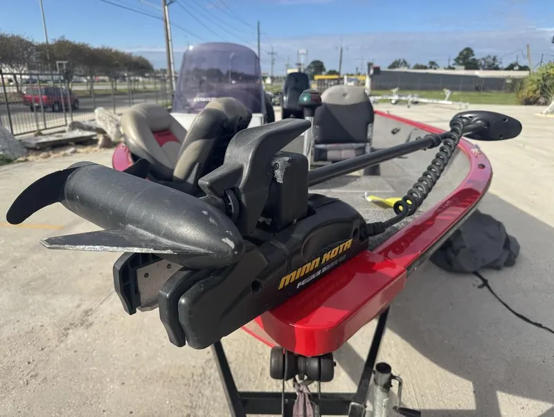 Slide: The Image of 2015 Tracker Pro Guide V-16 SC boat with Minn Kota trolling motor. - 11