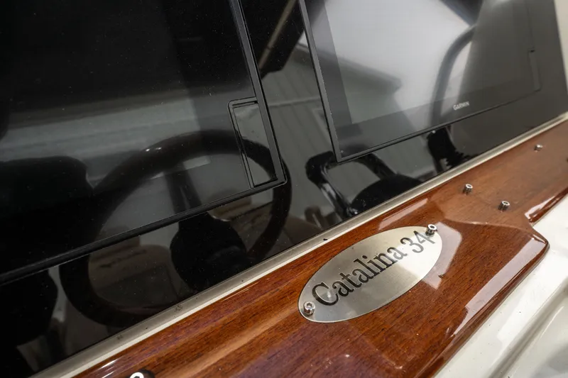 Slide: The Image of Chris-Craft Catalina 34 dashboard with navigation screens, 2018 model. - 14