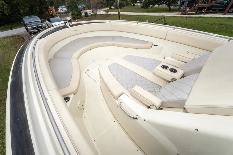 Slide: The Image of 2018 Chris-Craft Catalina 34 boat with spacious, luxurious seating area. - 17