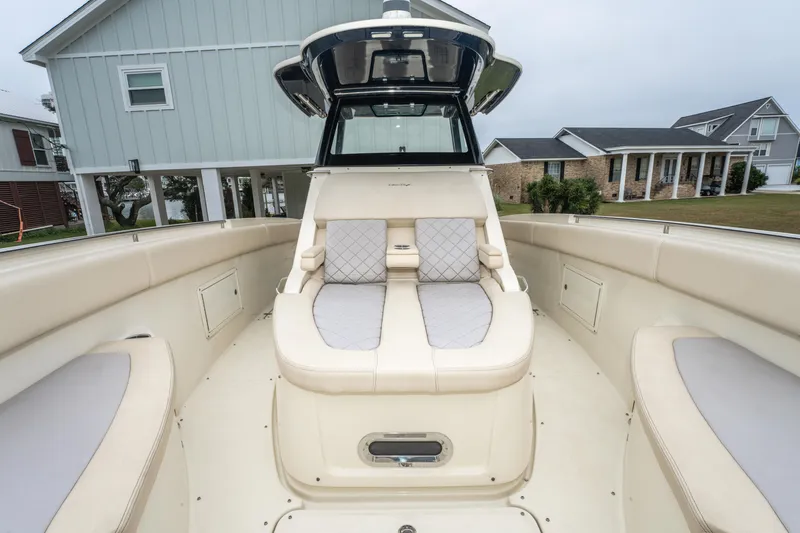 Slide: The Image of 2018 Chris-Craft Catalina 34 boat with luxurious seating and modern design. - 18