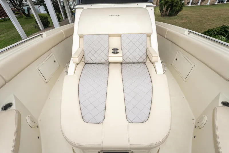 Slide: The Image of 2018 Chris-Craft Catalina 34 boat interior with luxurious seating and elegant design. - 19