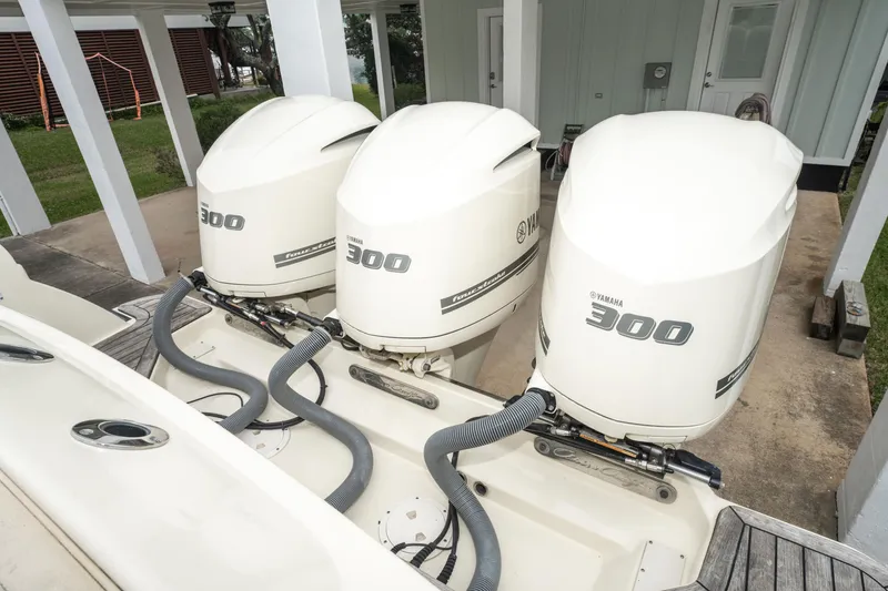 Slide: The Image of 2018 Chris-Craft Catalina 34 with triple Yamaha 300 engines docked. - 23