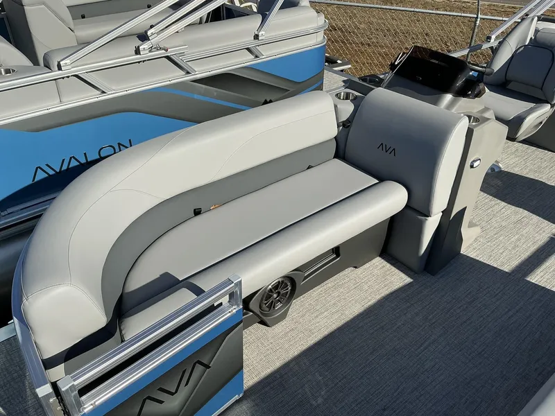 Slide: The Image of 2025 Avalon VLS 23 Quad Lounger boat interior with gray seating and modern design. - 4