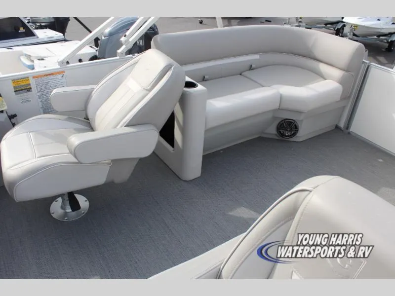 Slide: The Image of 2025 Godfrey Sweetwater 2286SBX boat interior with plush seating and modern design. - 10