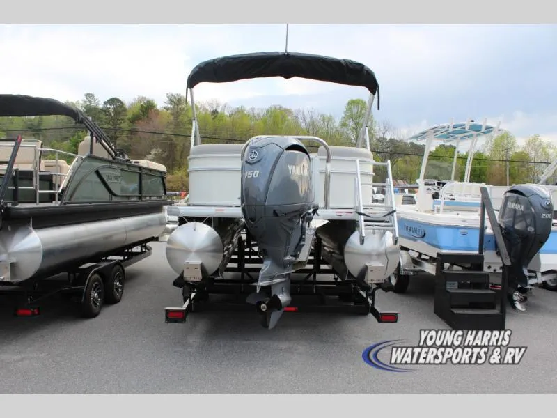 Slide: The Image of 2025 Godfrey Sweetwater 2286SBX pontoon boat with Yamaha 150 engine at dealership. - 4
