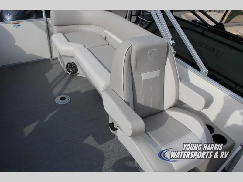 Slide: The Image of 2025 Godfrey Sweetwater 2286SBX boat interior with plush seating and modern design. - 9