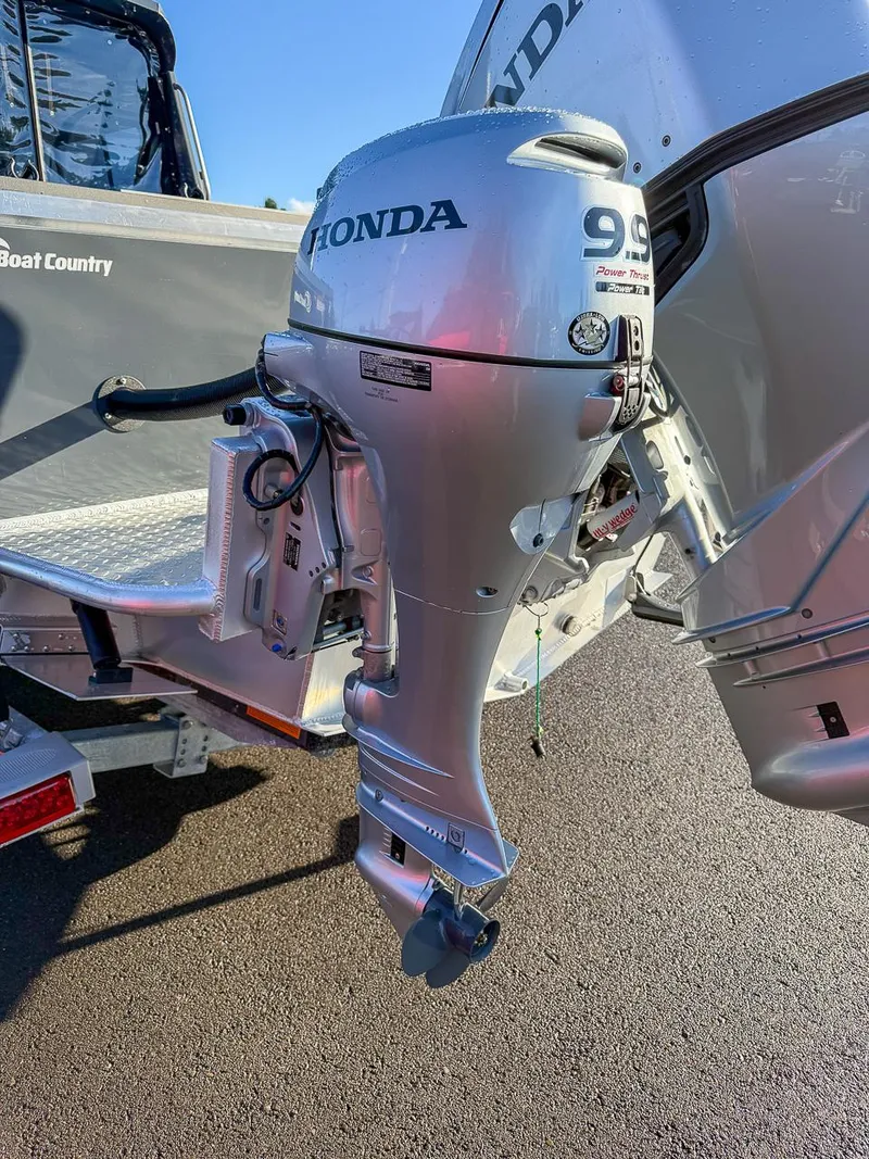 Slide: The Image of Honda outboard motor on 2021 Hewescraft 220 Ocean Pro Hard Top boat. - 15