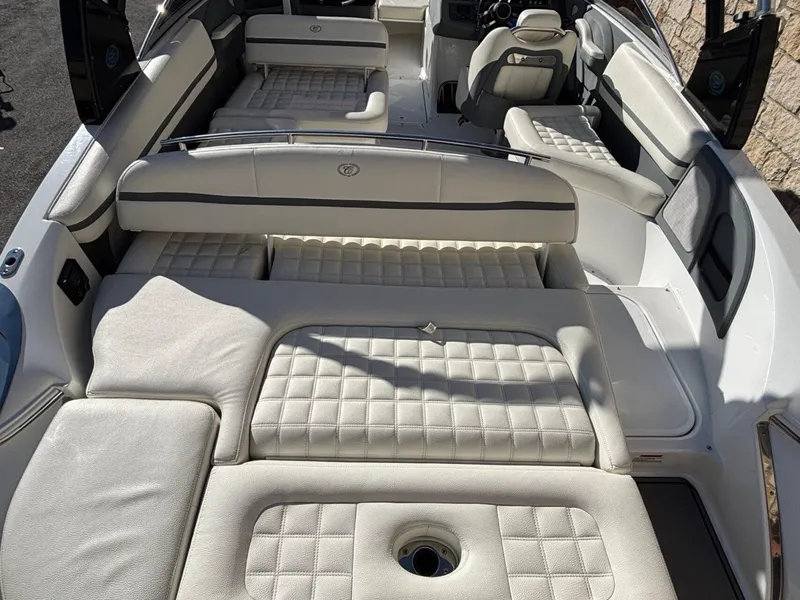Slide: The Image of 2017 Cobalt R5 boat interior with luxurious white seating and modern design. - 10