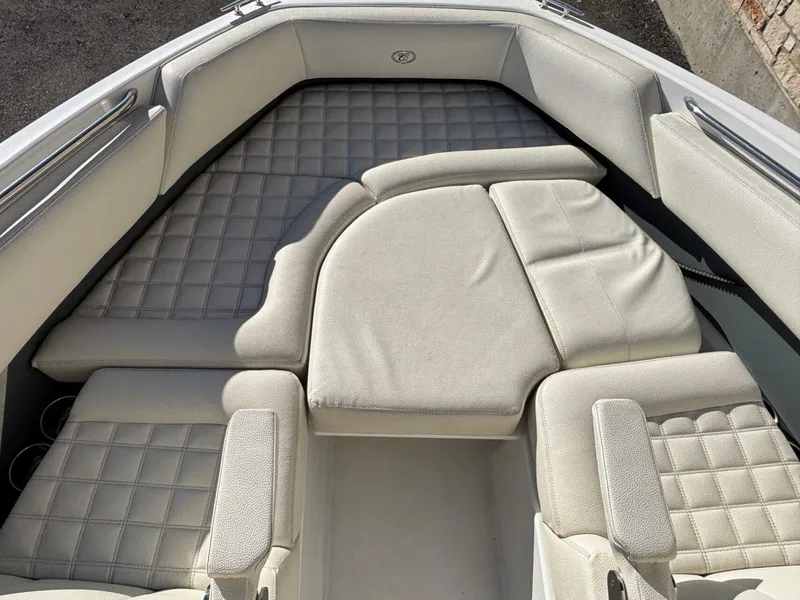 Slide: The Image of 2017 Cobalt R5 boat interior with cushioned seating and sleek design. - 16