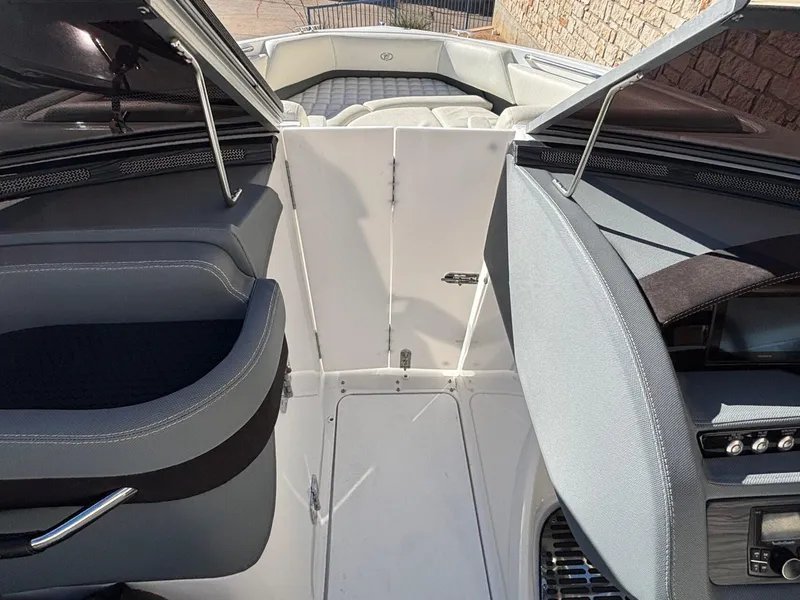 Slide: The Image of Interior view of a 2017 Cobalt R5 boat, featuring sleek seating and modern design. - 22