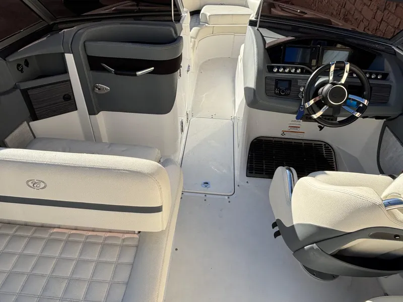 Slide: The Image of Interior of a 2017 Cobalt R5 boat, featuring sleek seating and modern dashboard. - 24
