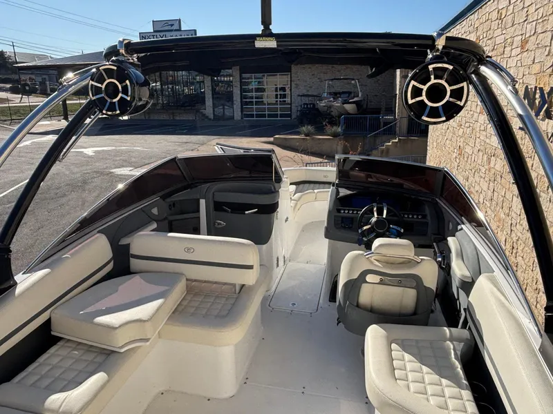 Slide: The Image of 2017 Cobalt R5 boat interior with plush seating and modern dashboard. - 8
