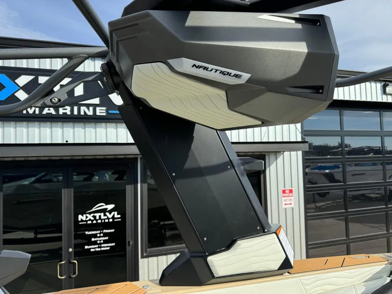 Slide: The Image of 2025 Nautique G23 boat tower detail at NXT LVL Marine dealership. - 40