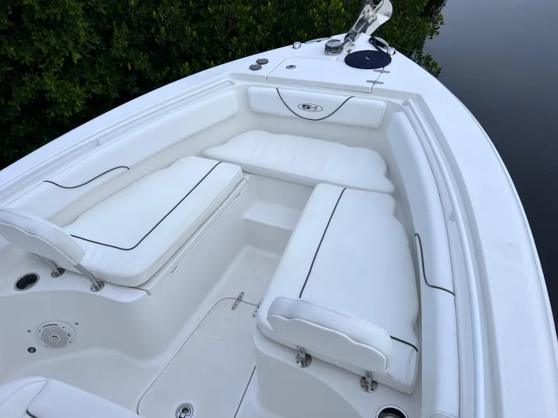 Slide: The Image of 2017 Sea Hunt Gamefish 25 boat interior with white seating, clean condition, only 200 hours. - 13