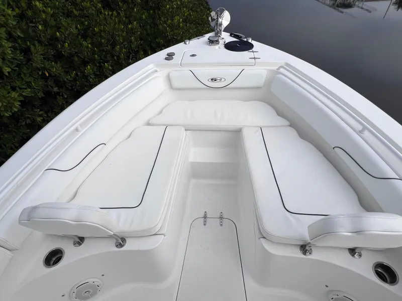 Slide: The Image of 2017 Sea Hunt Gamefish 25 boat interior with white seating, clean condition, only 200 hours. - 47