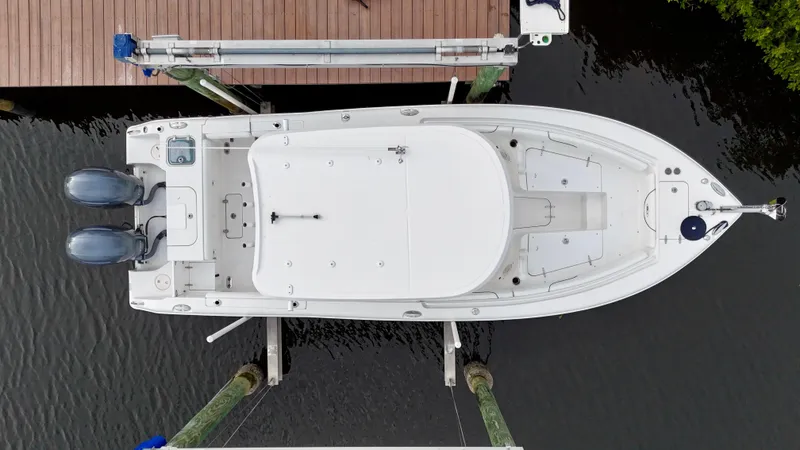 Slide: The Image of 2017 Sea Hunt Gamefish 25 boat, aerial view, docked, twin engines, clean condition. - 6