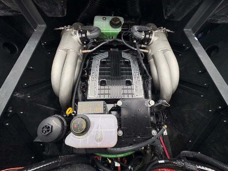 Slide: The Image of 2025 Malibu 25 LSV engine compartment showcasing a powerful supercharged engine. - 39