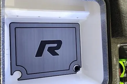 Slide: The Image of 2025 Ranger Z520R Cup-Equipped storage compartment with logo, featuring sleek design and functionality. - 17
