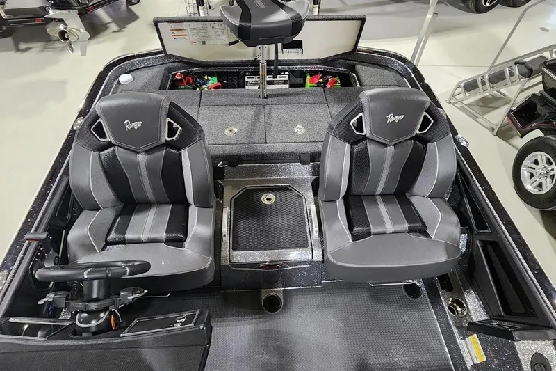 Slide: The Image of 2025 Ranger Z520R Cup-Equipped boat interior with dual seats and steering console. - 6