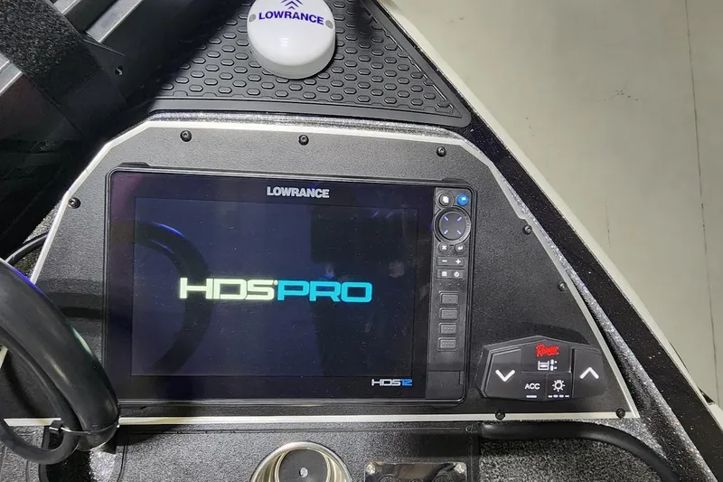Slide: The Image of Dashboard of 2025 Ranger Z520R with Lowrance HDS Pro display and controls. - 8