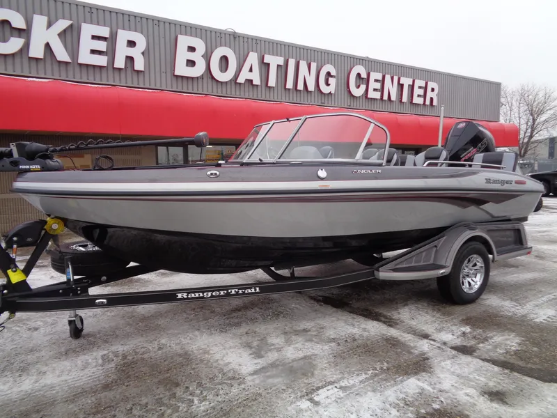 Slide: The Image of 2025 Ranger 1880MS boat at Tucker Boating Center, displayed on a trailer. - 1