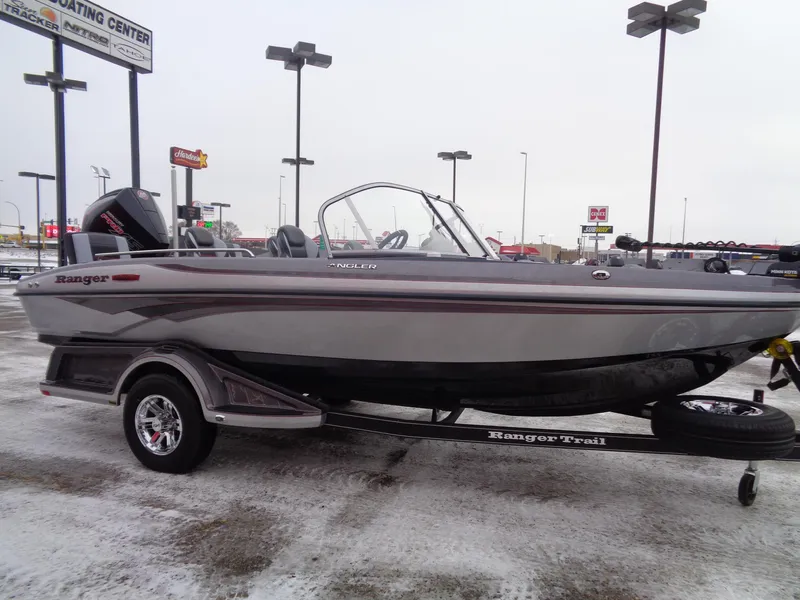 Slide: The Image of 2025 Ranger 1880MS boat on trailer in parking lot, side view. - 5