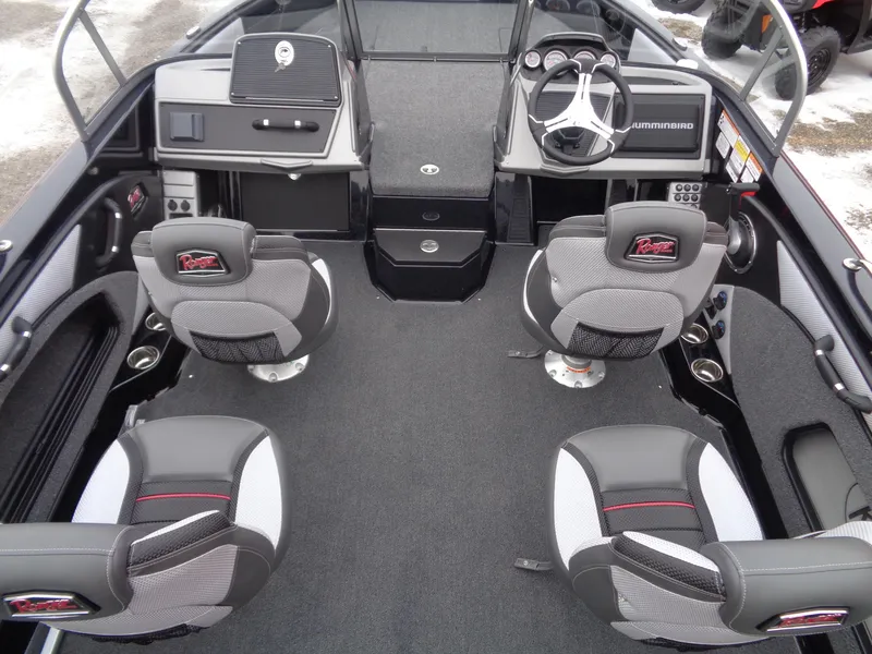 Slide: The Image of 2025 Ranger 1880MS boat interior with four seats and modern dashboard. - 6