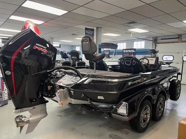 Slide: The Image of 2025 Ranger Z520R Cup-Equipped boat with Mercury Pro XS engine in showroom. - 2