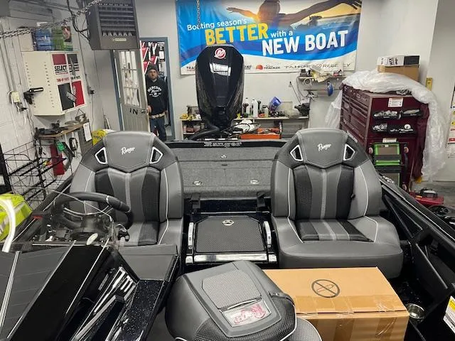 Slide: The Image of 2025 Ranger Z520R Cup-Equipped boat interior in a workshop setting. - 7