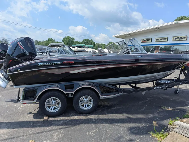 Slide: The Image of 2025 Ranger 2080MS boat on trailer, parked outdoors under a clear sky. - 3