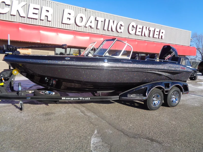 Slide: The Image of 2025 Ranger 1880MS boat at a boating center, displayed on a trailer. - 2